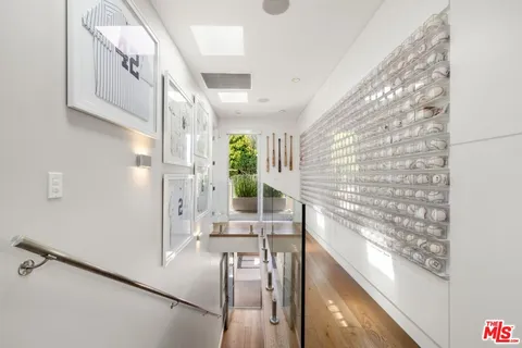 a view of balcony and wooden floor