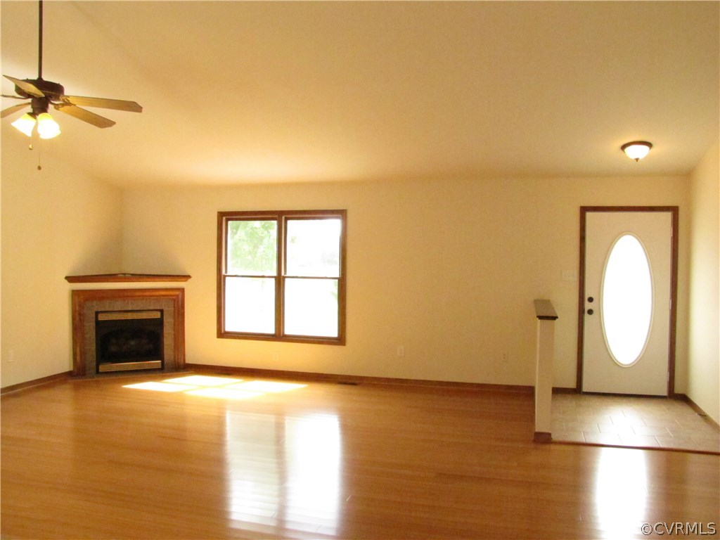 15276 Lebanon Road Spring Grove, VA 23881 - Photo 13 of 21 Great room with corner gas f/p and vaulted ceiling