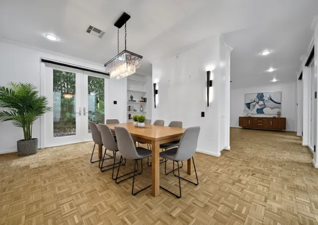 a view of a dining room with furniture window and outside view