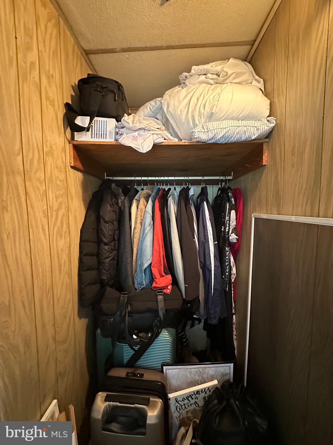 275 Rochelle Avenue, Unit 2 Philadelphia, PA 19128 - Photo 17 of 18 a view of walk in closet with clothes and shoes