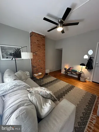 a bedroom with bed and window