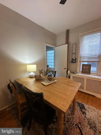 a view of a kitchen area with furniture and window