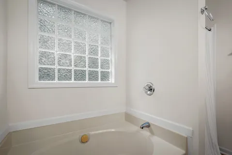 a bathroom with a tub