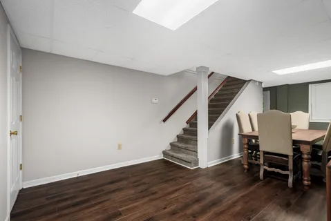 a view of livingroom with furniture and wooden floor