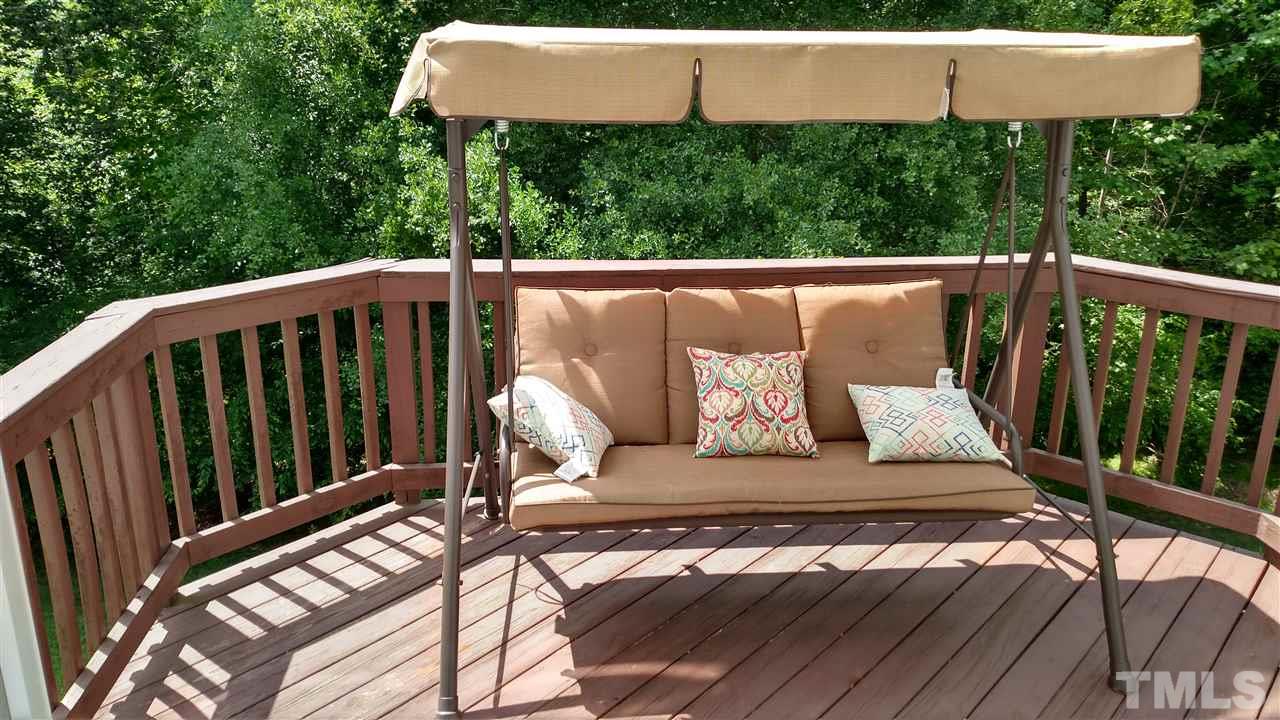 2304 Spruce Shadows Lane Raleigh, NC 27614 - Photo 19 of 25 a view of a patio with wooden floor
