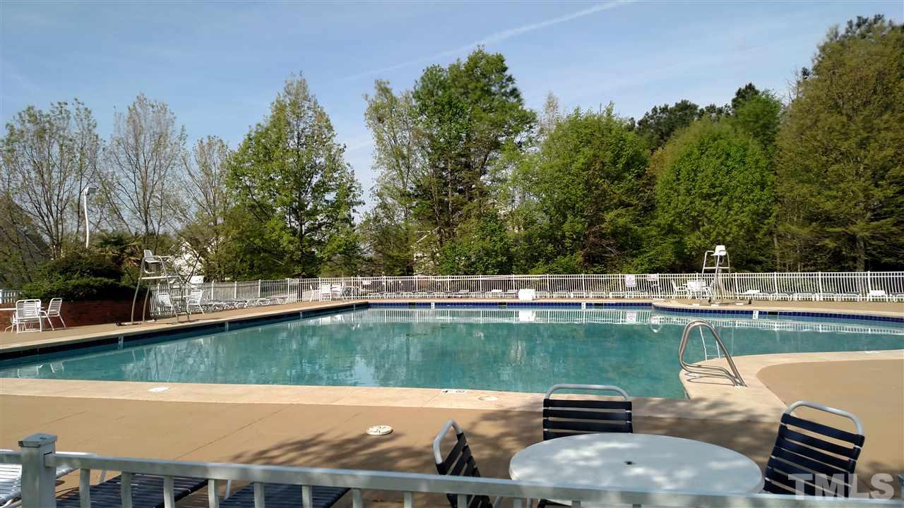 2304 Spruce Shadows Lane Raleigh, NC 27614 - Photo 24 of 25 a view of a swimming pool with a patio