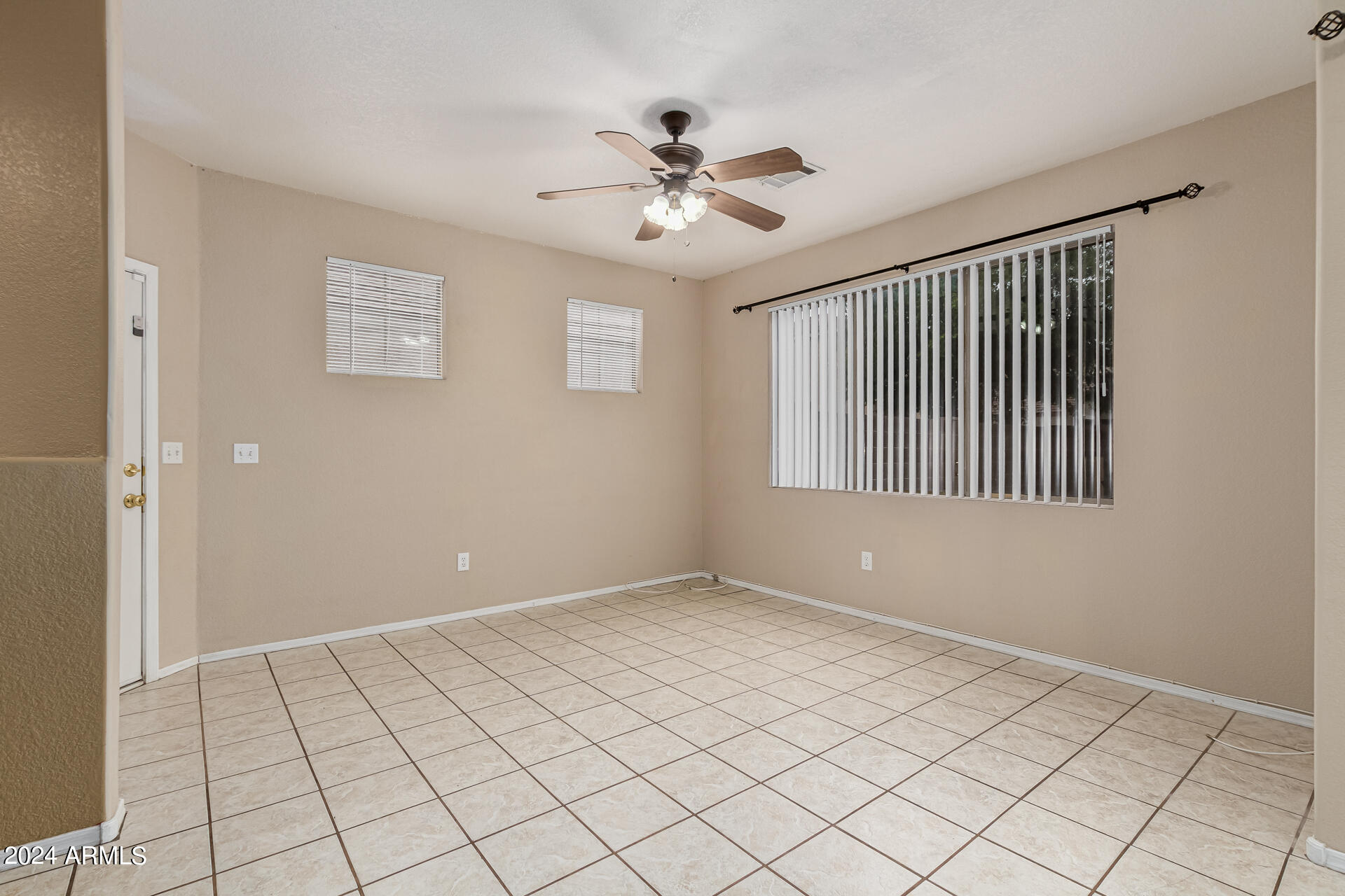 1371 South Boulder Street, Unit A Gilbert, AZ 85296 - Photo 11 of 43 a view of an empty room and window