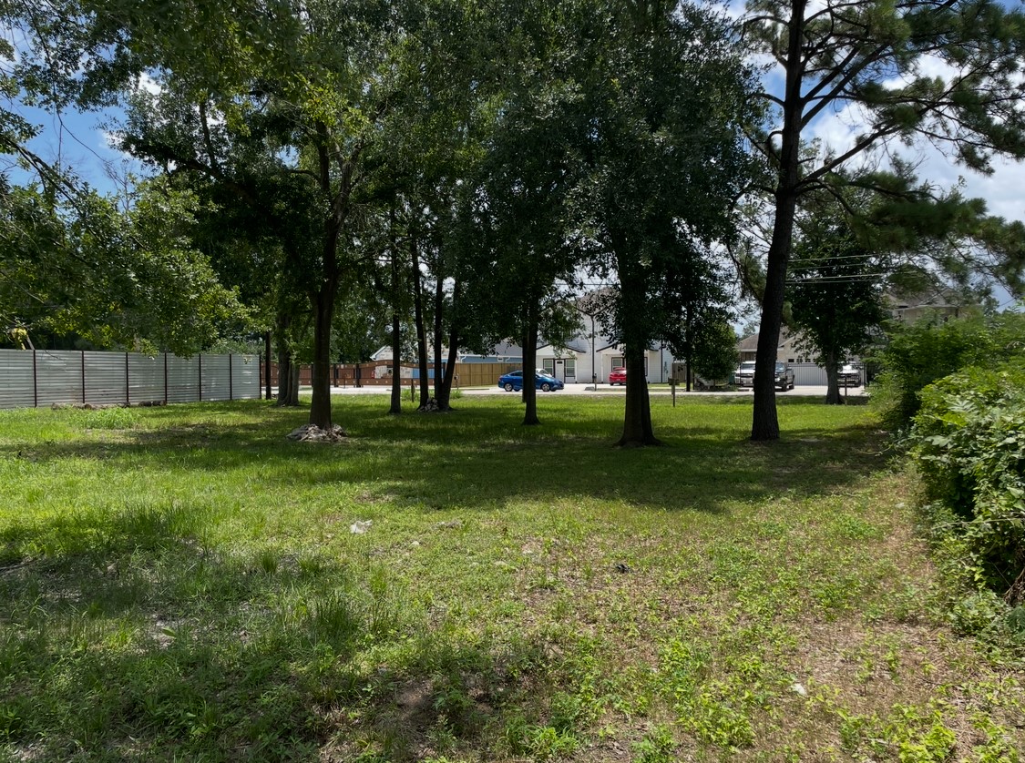 5203 Mayle Street Houston, TX 77016 - Photo 3 of 6 a view of grassy field with benches and trees all around