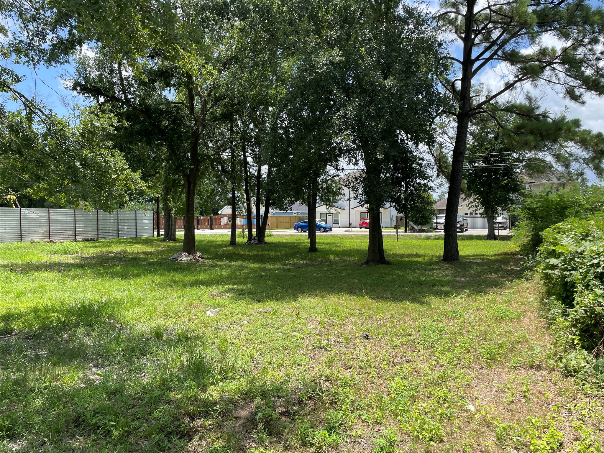 5203 Mayle Street Houston, TX 77016 - Photo 6 of 6 a view of grassy field with benches and trees all around