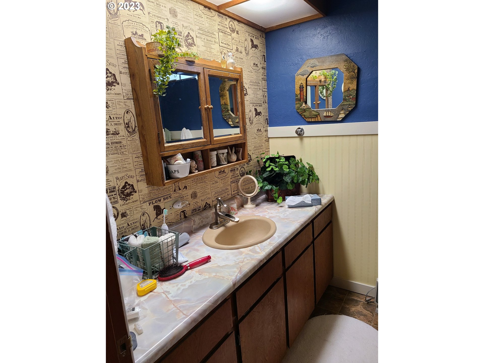 313 Northeast Garfield Street Enterprise, OR 97828 - Photo 23 of 24 a bathroom with a sink and a mirror