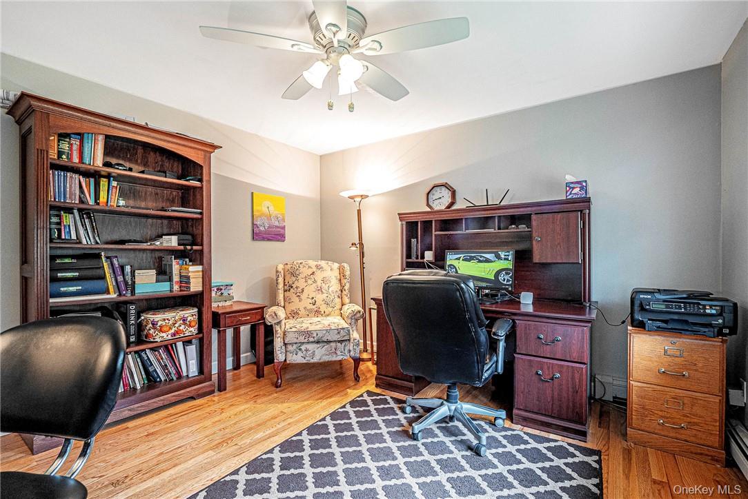 26 Waterbury Road Warwick, NY 10990 - Photo 16 of 30 a workspace with furniture bookshelf and a workspace