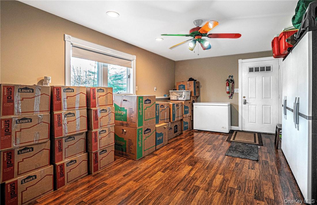26 Waterbury Road Warwick, NY 10990 - Photo 21 of 30 a view of a livingroom with furniture hardwood floor and a ceiling fan