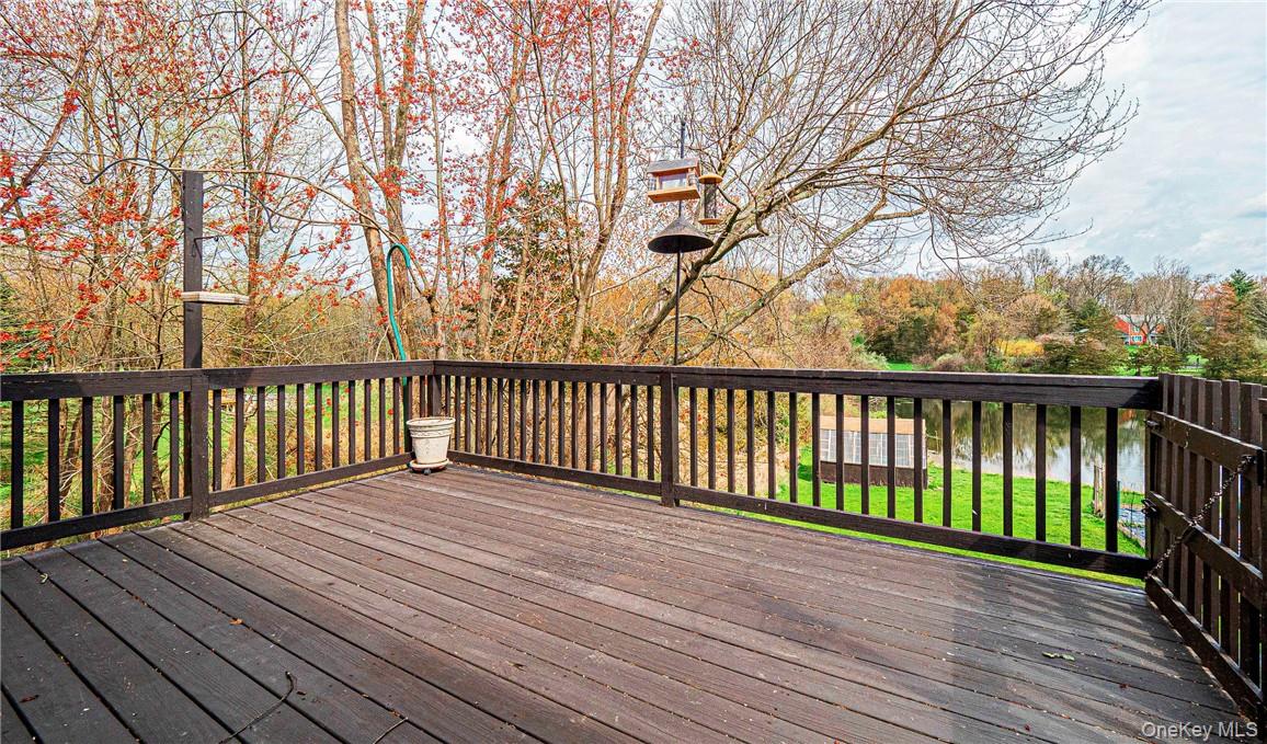 26 Waterbury Road Warwick, NY 10990 - Photo 25 of 30 a balcony with wooden floor and trees