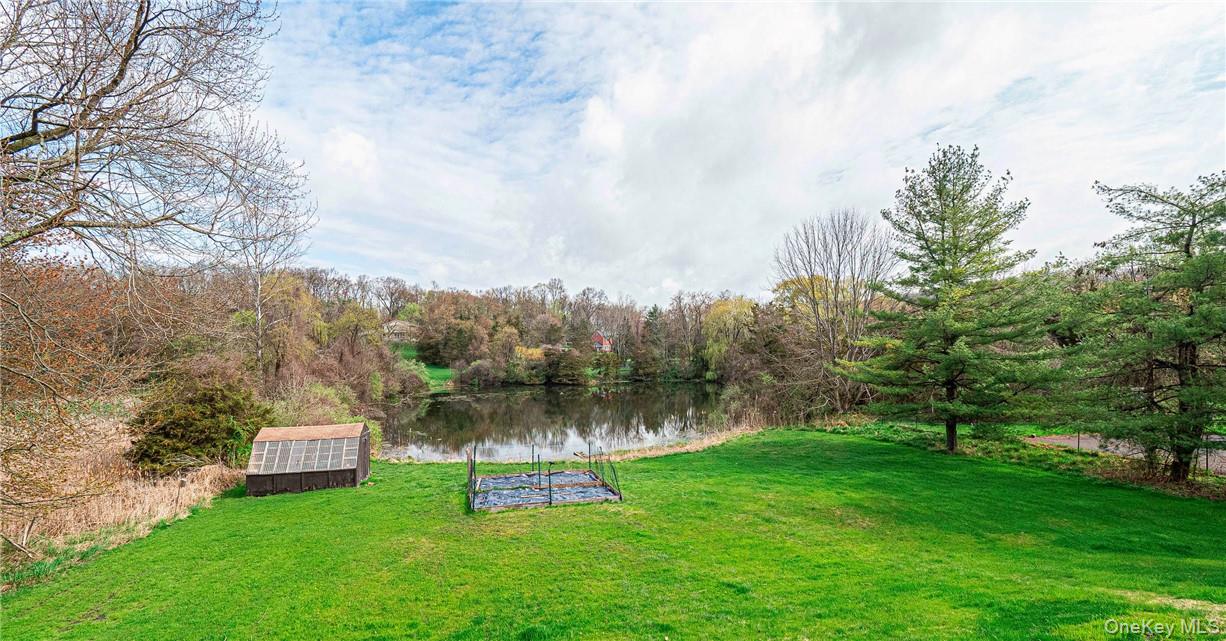 26 Waterbury Road Warwick, NY 10990 - Photo 27 of 30 a view of a lake with a yard