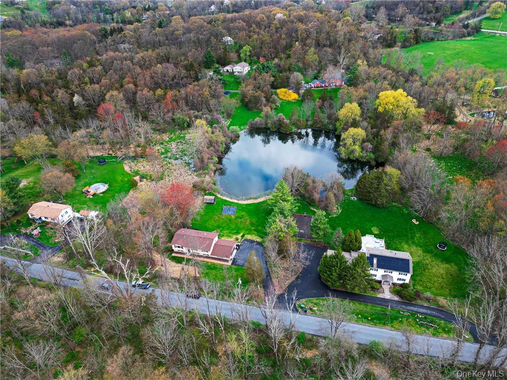 26 Waterbury Road Warwick, NY 10990 - Photo 29 of 30 an aerial view of a house with a garden and swimming pool