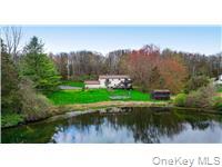 26 Waterbury Road Warwick, NY 10990 - Photo 30 of 30 a black and white photo of a lake