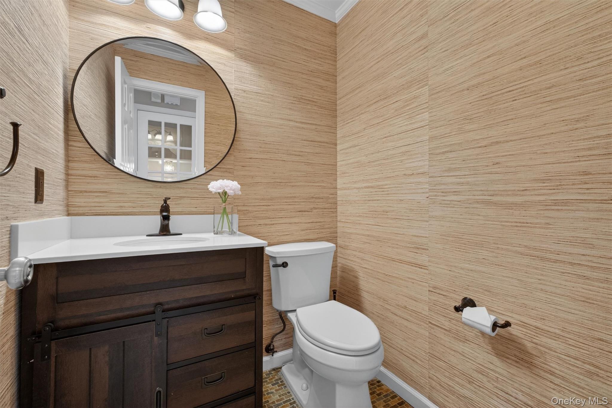 45 East Hill Road Cortlandt Manor, NY 10567 - Photo 15 of 48 a bathroom with a toilet a sink and mirror