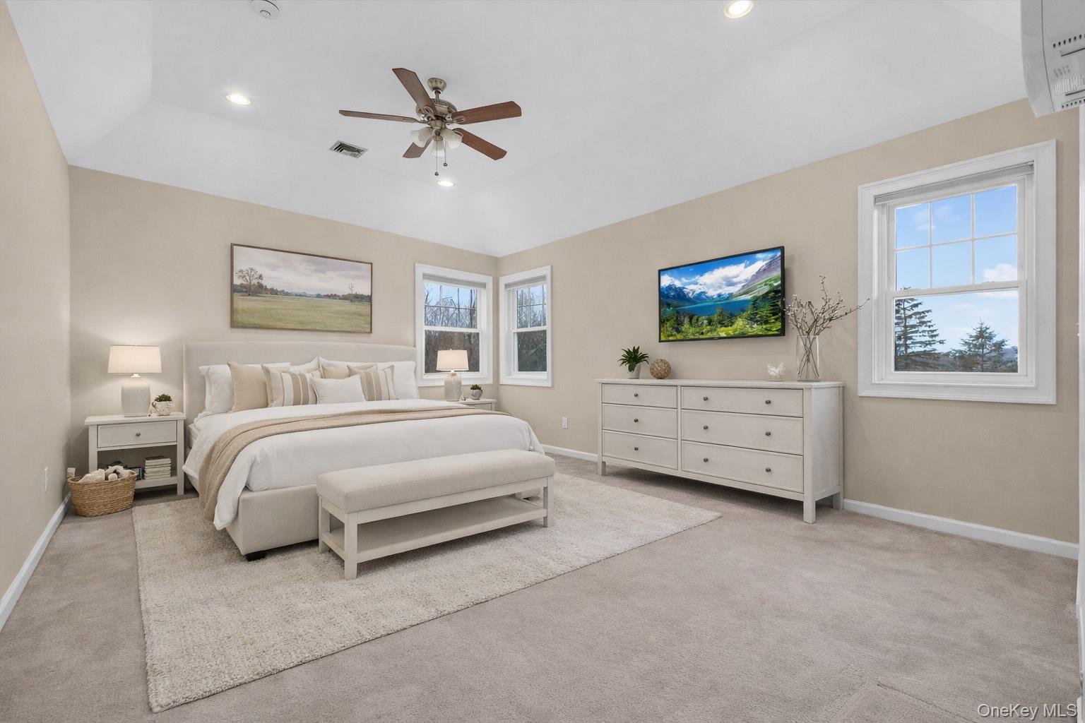 45 East Hill Road Cortlandt Manor, NY 10567 - Photo 18 of 48 a spacious bedroom with a bed and window