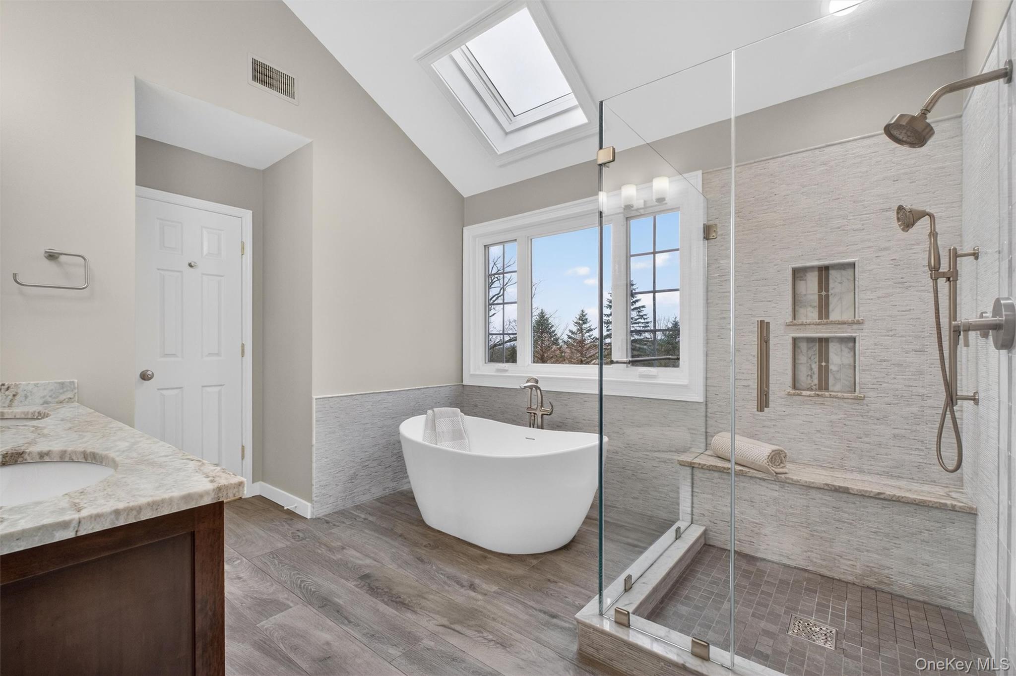 45 East Hill Road Cortlandt Manor, NY 10567 - Photo 20 of 48 a bathroom with a tub sink and mirror