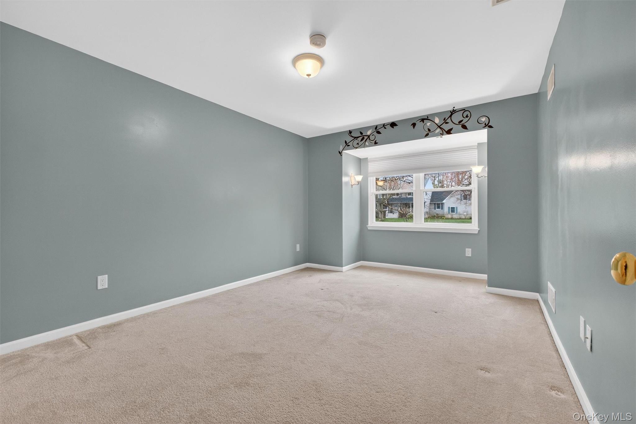 45 East Hill Road Cortlandt Manor, NY 10567 - Photo 25 of 48 a view of an empty room with a window