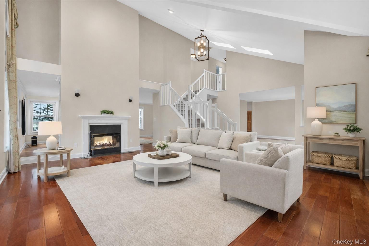 45 East Hill Road Cortlandt Manor, NY 10567 - Photo 3 of 48 a living room with furniture and a fireplace