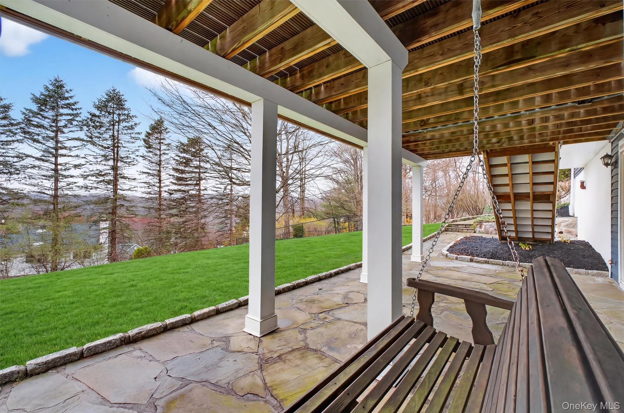 45 East Hill Road Cortlandt Manor, NY 10567 - Photo 36 of 48 a view of balcony with a patio