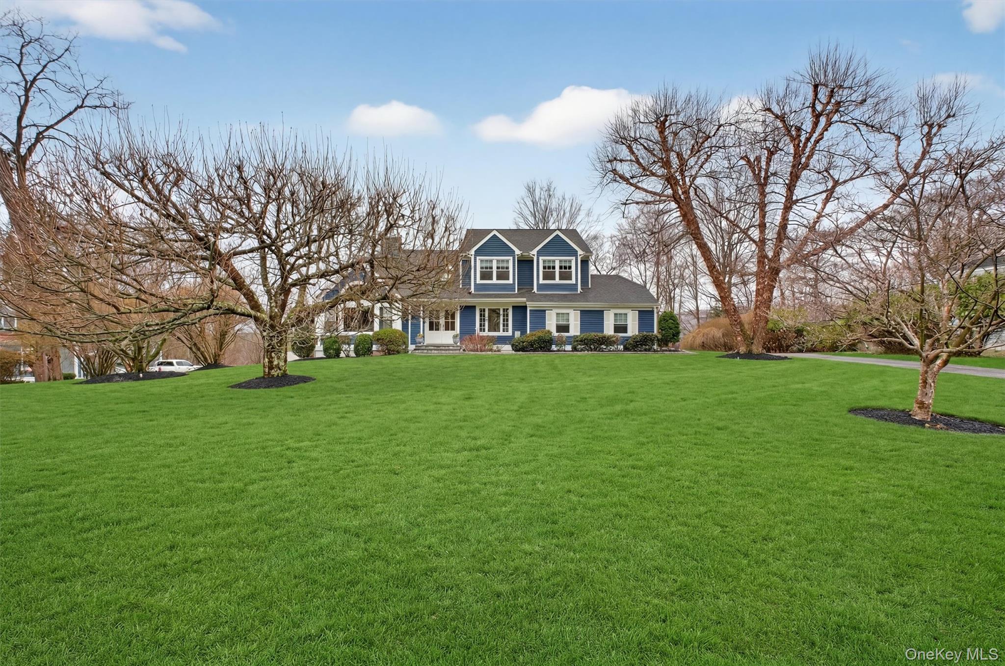 45 East Hill Road Cortlandt Manor, NY 10567 - Photo 42 of 48 a view of a house with a big yard