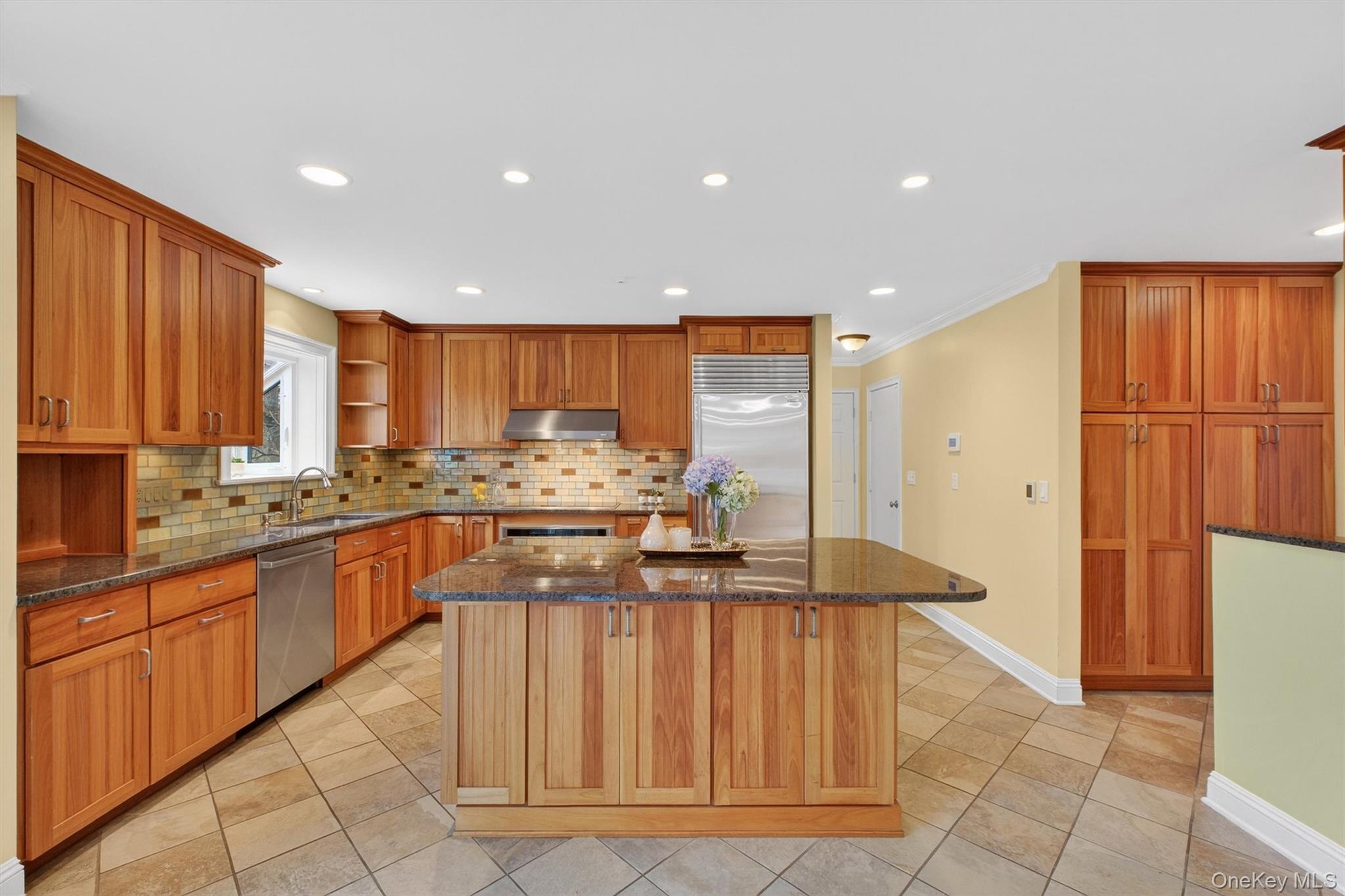 45 East Hill Road Cortlandt Manor, NY 10567 - Photo 6 of 48 a kitchen with stainless steel appliances granite countertop a refrigerator and a sink