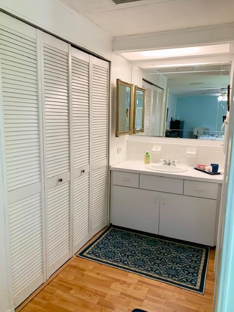505 North Ruby Avenue Key Largo, FL 33037 - Photo 13 of 53 a bathroom with a sink a mirror and shower