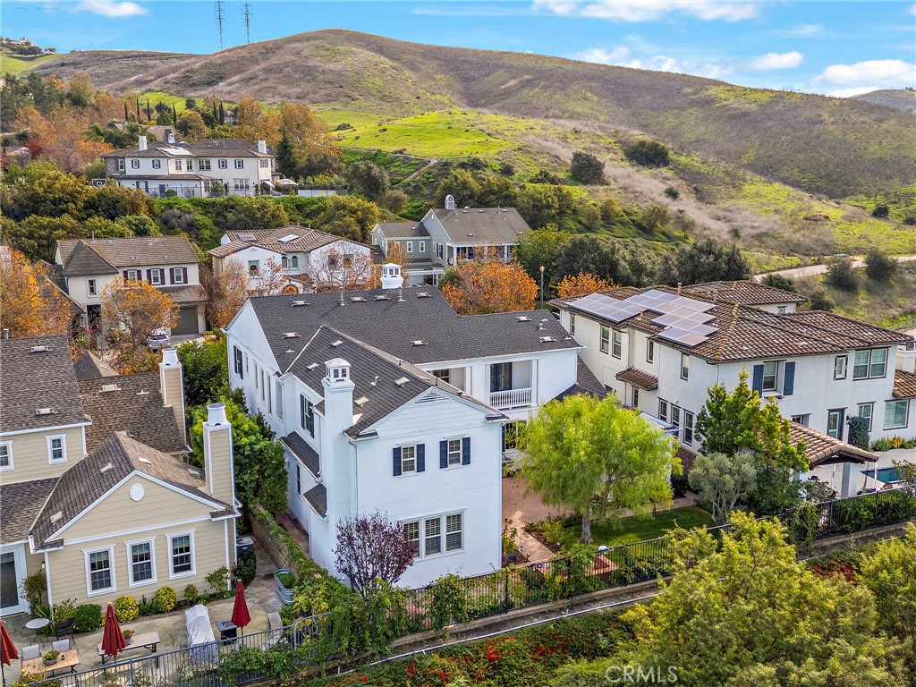 3 Eric Street Ladera Ranch, CA 92694 - Photo 25 of 35 an aerial view of residential houses with a green field