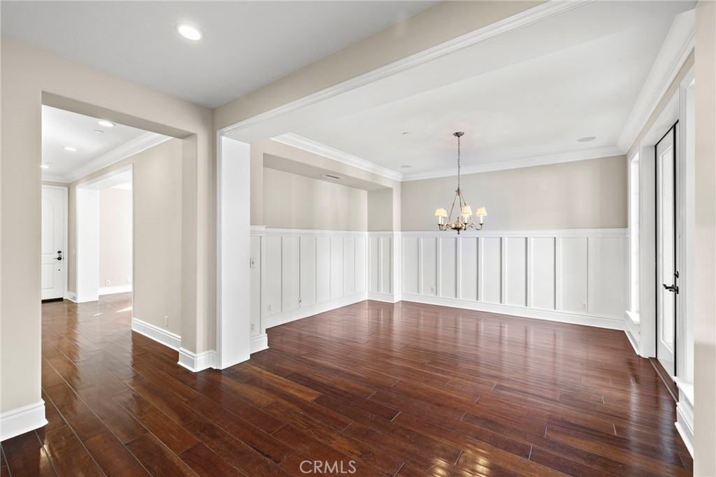 3 Eric Street Ladera Ranch, CA 92694 - Photo 7 of 35 a view of an empty room with wooden floor and a window