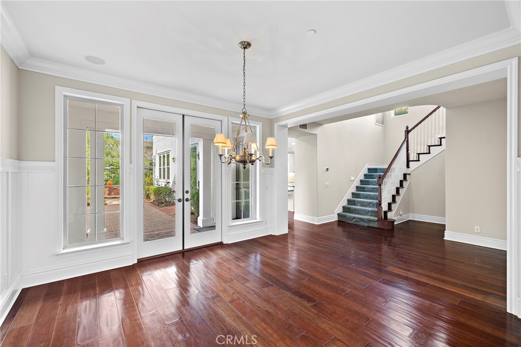 3 Eric Street Ladera Ranch, CA 92694 - Photo 8 of 35 a view of an empty room with wooden floor and a window