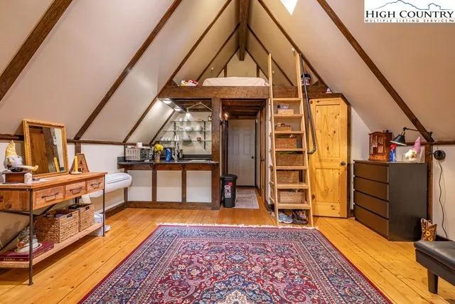 a view of a living room with a flat screen tv
