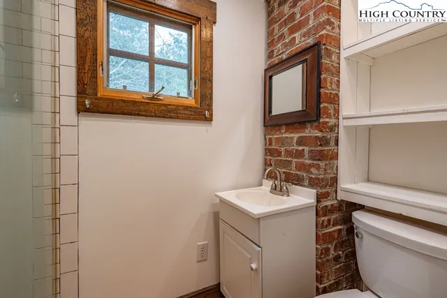 a bathroom with a sink and a toilet