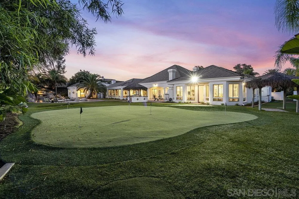 17864 Old Winemaster Way Poway, CA 92064 - Photo 20 of 22 a front view of a house with a yard