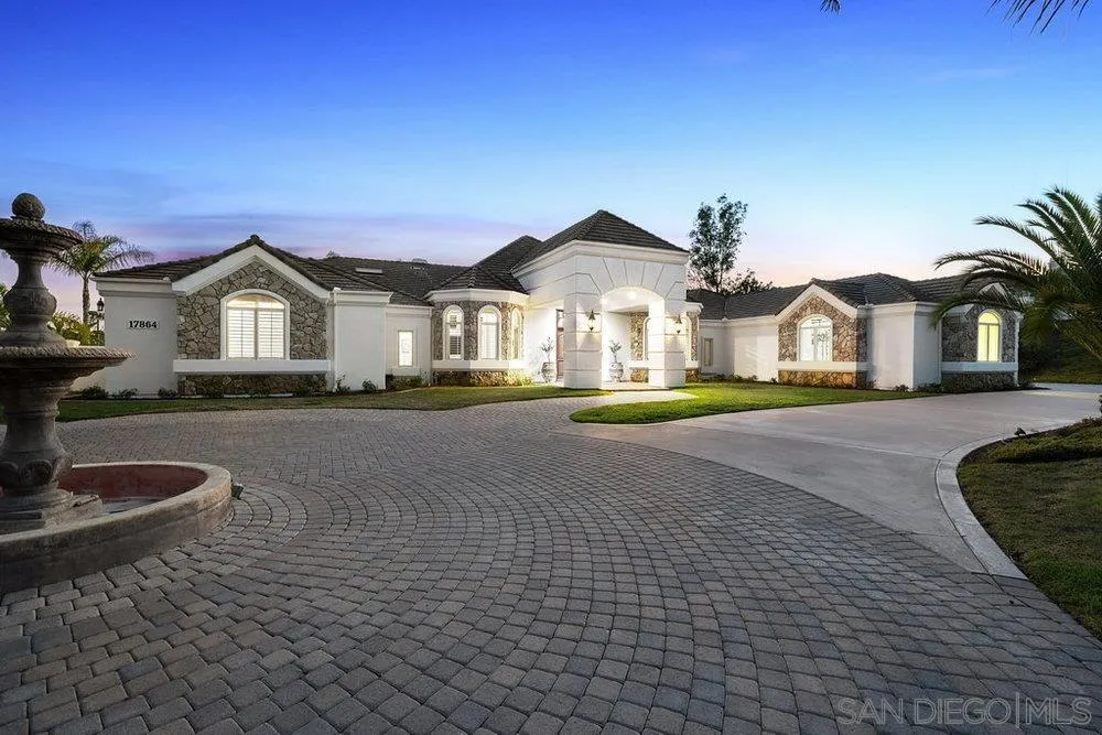 17864 Old Winemaster Way Poway, CA 92064 - Photo 2 of 22 a front view of a house with a yard