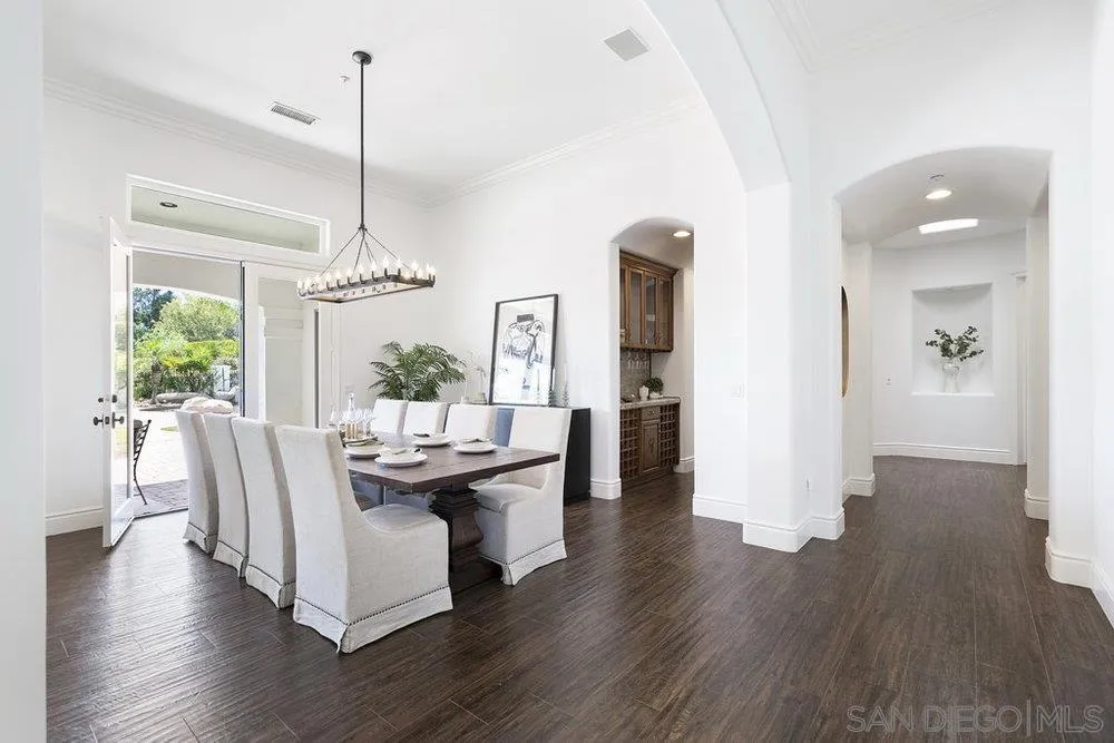 17864 Old Winemaster Way Poway, CA 92064 - Photo 6 of 22 a view of a dining room with furniture window and wooden floor