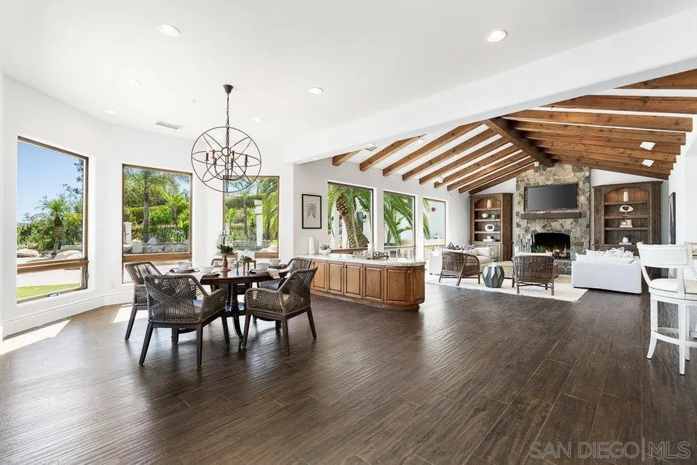 17864 Old Winemaster Way Poway, CA 92064 - Photo 9 of 22 a view of a dining room with furniture window and wooden floor