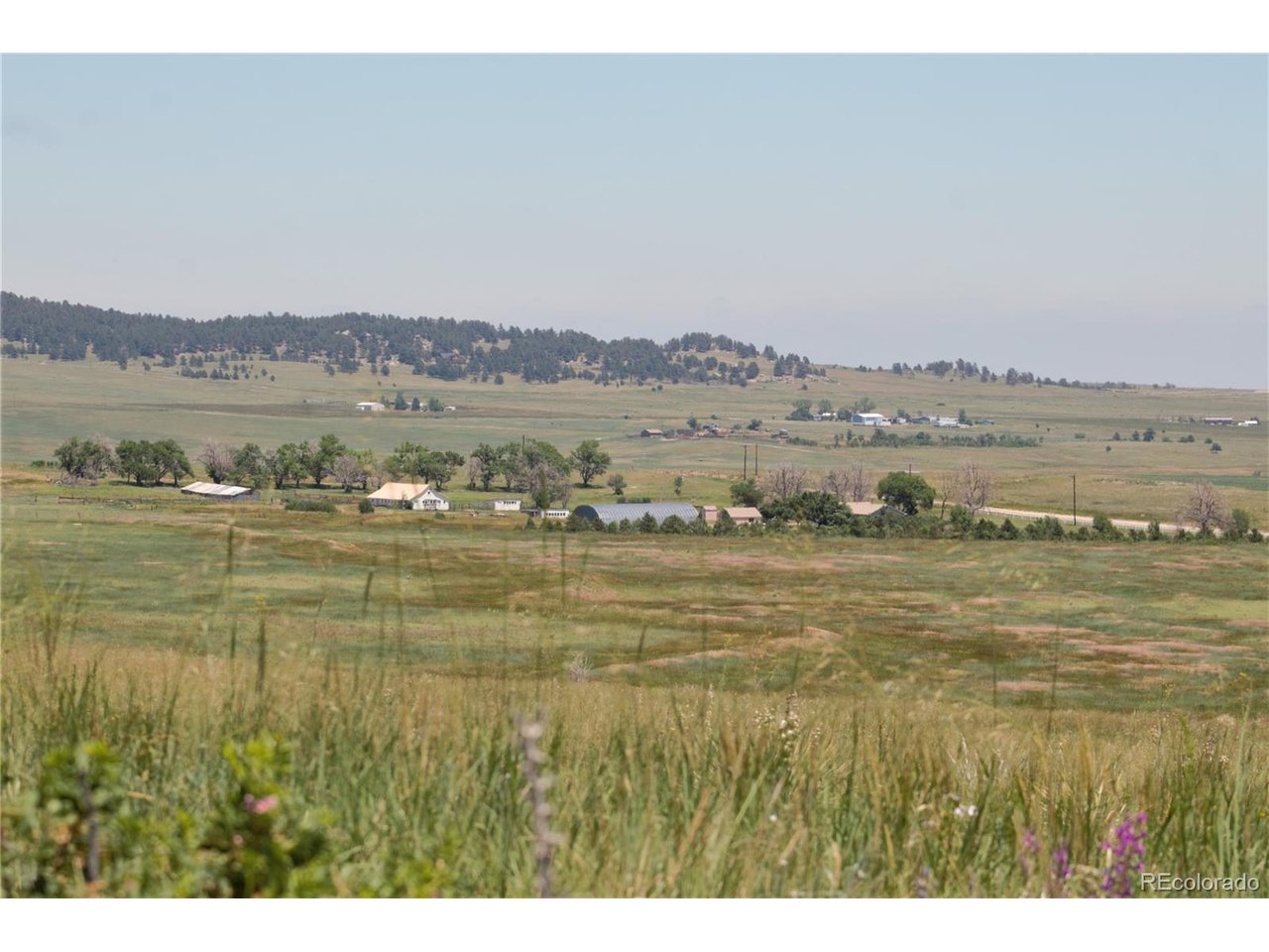 16 Sweet Road Calhan, CO 80808 - Photo 5 of 9 a view of lake with mountain in the background