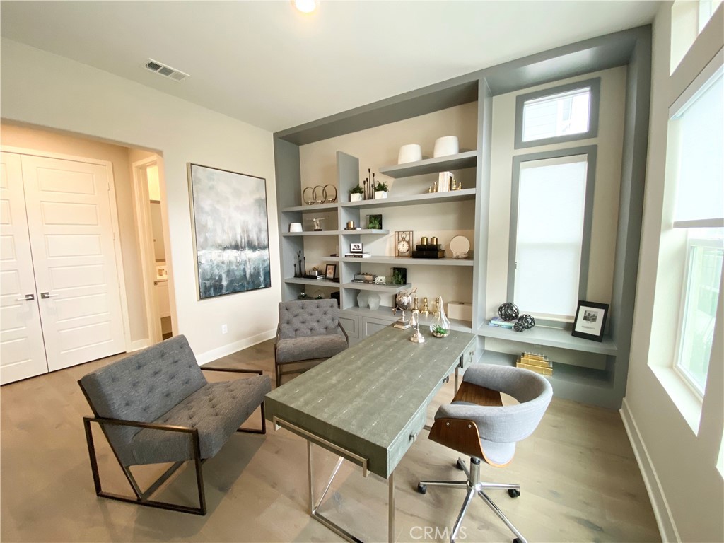 62 Hawking Irvine, CA 92618 - Photo 12 of 37 a room with furniture and a large window