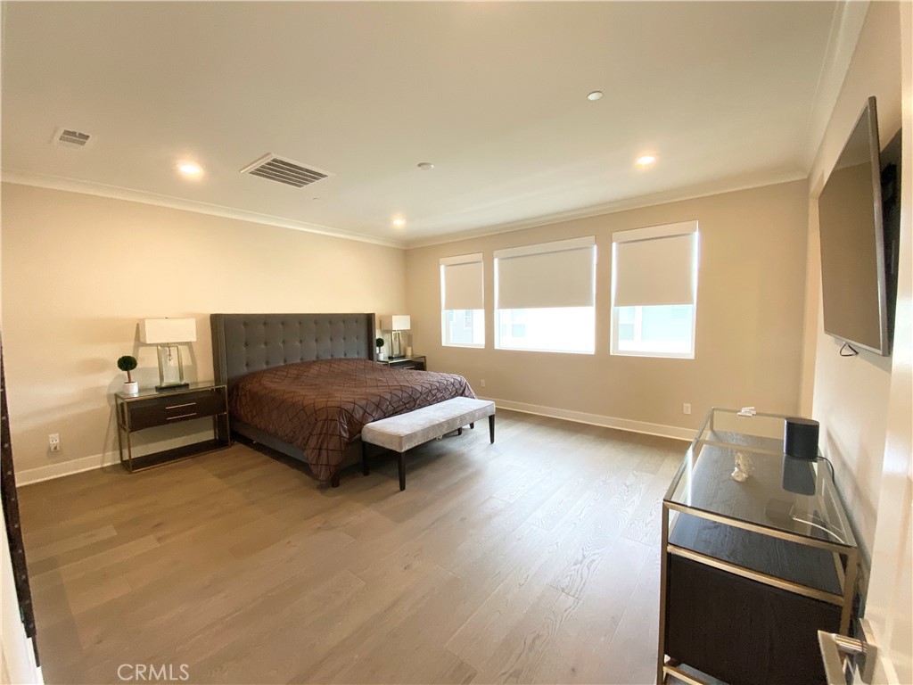 62 Hawking Irvine, CA 92618 - Photo 16 of 37 a living room with furniture and a flat screen tv