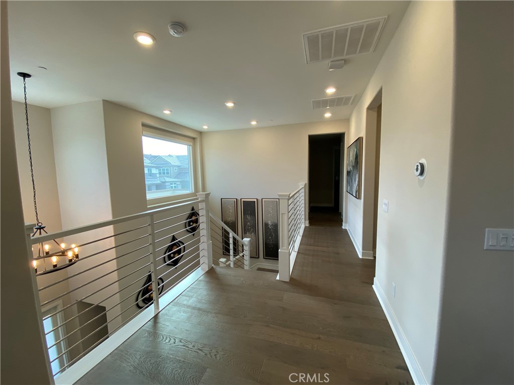 62 Hawking Irvine, CA 92618 - Photo 23 of 37 a view of a hallway with windows