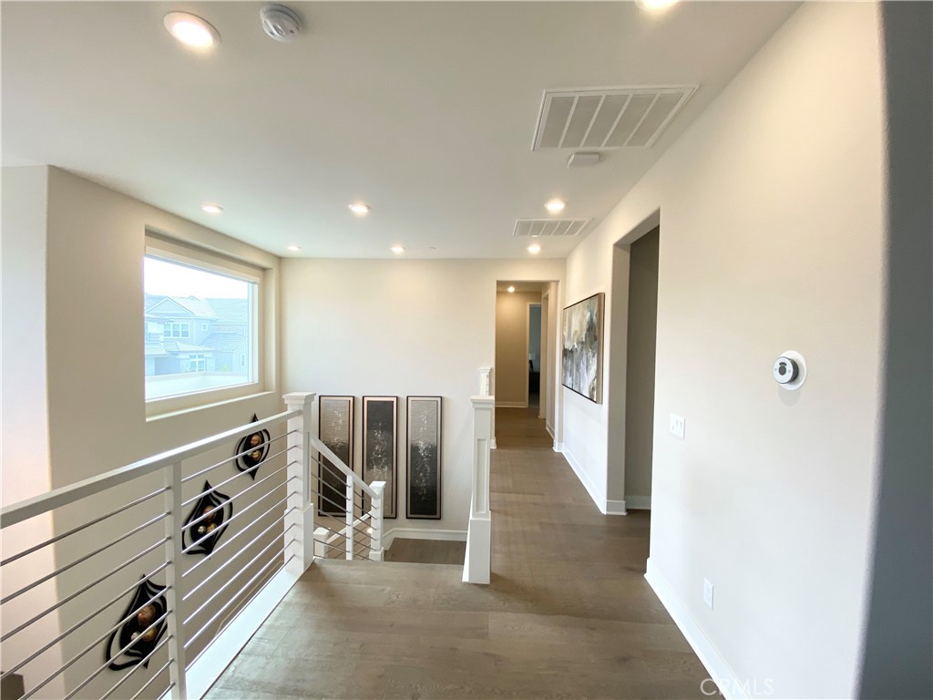 62 Hawking Irvine, CA 92618 - Photo 29 of 37 a view of a hallway with furniture and windows