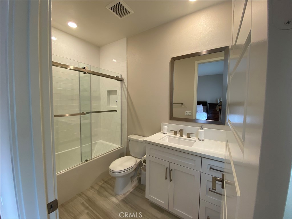 62 Hawking Irvine, CA 92618 - Photo 30 of 37 a bathroom with a sink toilet and shower