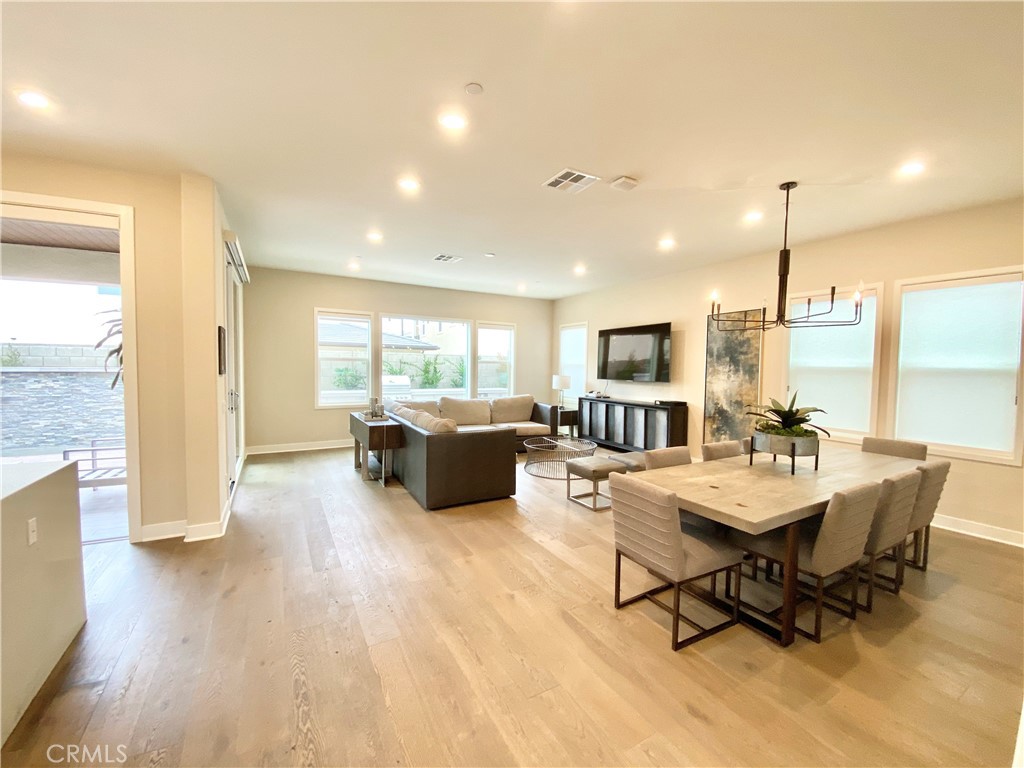 62 Hawking Irvine, CA 92618 - Photo 6 of 37 a living room with furniture fireplace and flat screen tv