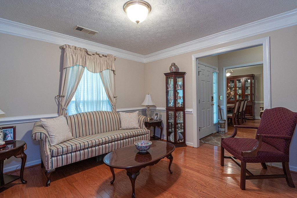 7386 Garrett Road Midland, GA 31820 - Photo 4 of 29 a living room with furniture and a window