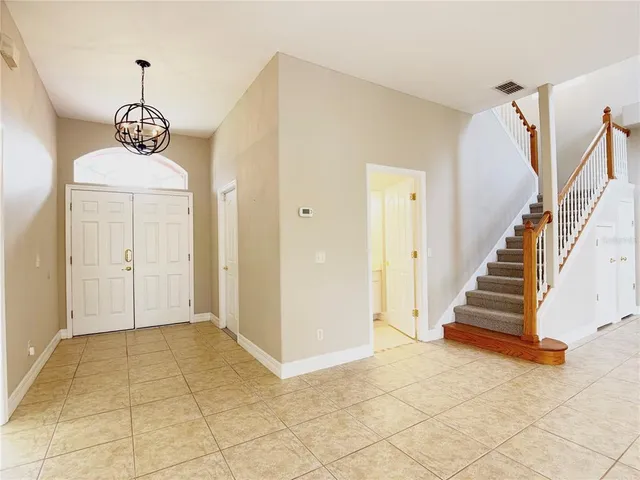 a view of an entryway with staircase