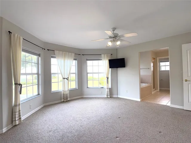 a view of a livingroom with a flat screen tv