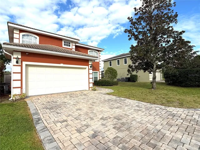 a view of a swimming pool with a lounge chair