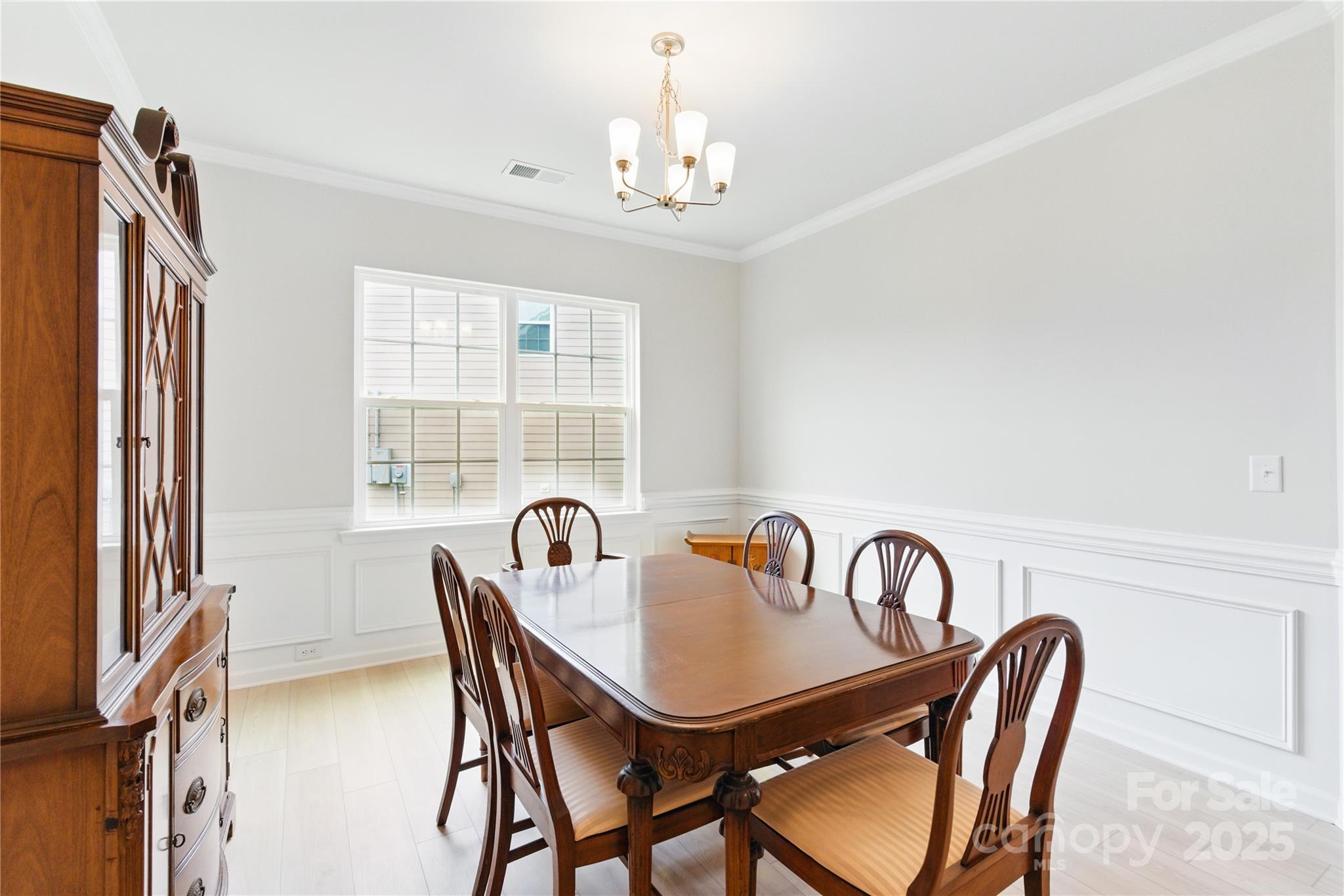 4069 Havenport Circle Tega Cay, SC 29708 - Photo 19 of 48 a view of a dining room with furniture window and outside view